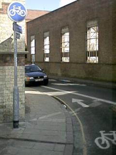 (Photo of a parked car in a cycle lane)